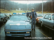Senior Trooper Larry Hacker during his Cadet Class in 1988/89 standing next to a special Chrysler Daytona cruiser. Trooper Hacker was shot and killed in the line of duty in Ritchie County in 1993.